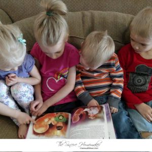 Clarissa's Family of The Sincere Homemaker with their copy of Wonderfully Made: God's Story of Life from Conception to Birth for kids from ages 5-11.
