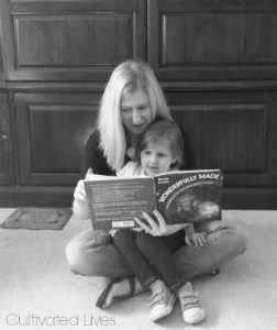 Heather & Daughter of Cultivated Lives with their copy of Wonderfully Made: God's Story of Life from Conception to Birth for kids from ages 5-11.